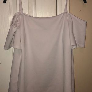 It’s a white off the  shoulder shirt
